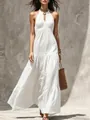 Detail view of a white halter neck maxi dress with tiered skirt for summer vacations. - S / Top And Bottom / White