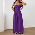 Modern deep purple sleeveless halter neck wide-leg jumpsuit for a stylish summer casual look - Dark Violet