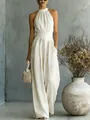 Elegante mono beige con cuello halter, pernera ancha y diseño entallado para un estilo chic. - S / Blanco Roto