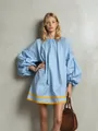 Full-body view of a light blue puff sleeve babydoll dress with yellow contrast striped hem. - S / Tops / Sky Blue