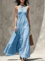 Dettaglio di un abito lungo azzurro a sottoveste con gonna a balze e scollo a V profondo - Taglia S / Sopra e Sotto / Celeste