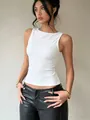 Close-up of white ribbed sleeveless tank top featuring a slim fit and classic round neck - S / Tops / White