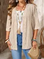 Close-up detail of women's beige hollow-out knit cardigan in bohemian casual style - 0XL / Tops / Apricot