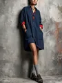 Detail of navy blue shirt dress with red contrast cuffs and artistic textured background - S / Top And Bottom / Dark Blue