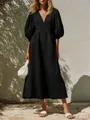 Elegant black V-neck midi dress with puff sleeves and cinched waist for a vacation look. - S / Tops / Black