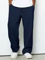 Detailed view showing the navy blue waffle knit texture of loose casual drawstring pants - Navy Blue