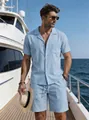 Detailed view of a light blue linen short sleeve shirt and shorts set on a luxury boat - Sky Blue