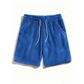 Gedetailleerd overzicht van de blauwe koraalfleece short met witte trekkoord in de taille - S / Bottoms / Blauw