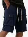 Detail of men's dark blue waffle knit cargo shorts with pocket patch and drawstring - S / Bottoms / Navy (Without Label)