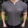 Detail of gray men's slim-fit athletic t-shirt with mesh texture and printed logo - 3XL / Tops / Volcanic Ash Print