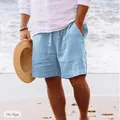 Pantaloncini da uomo azzurro in cotone e lino con coulisse su una spiaggia soleggiata - Taglia S / Pantaloni e gonne / Azzurro