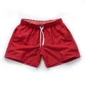 Men's solid red quick-dry beach shorts with an elastic drawstring waist for summer sports - S / Bottoms / Red