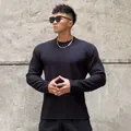 Sweat-shirt noir tendance à manches longues pour hommes avec col rond et maille gaufrée - Noir