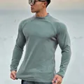 Detail view of men's muscle fit long sleeve thermal t-shirt in soft green fabric. - M / Tops / Green-Gray