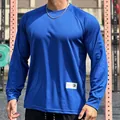 Close-up of men's athletic blue mesh long sleeve shirt for gym and outdoor sports - M / Tops / Sapphire Blue