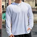 Detail view of breathable white mesh long-sleeve athletic t-shirt for men's fitness - M / Tops / White