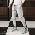 Men's winter fleece-lined gray joggers sweatpants with drawstring waist - M / Bottoms / Light Gray
