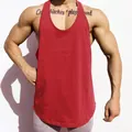 Detailed front view of a red breathable cotton gym stringer tank top for men's muscle training - M / Tops / Red
