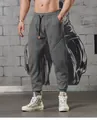 Men's grey sports jogger pants featuring 3D splicing design and adjustable drawstring waist - Space Gray