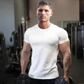 Men's muscle fit white cotton sports t-shirt shown in a professional gym setting - M / Top (25-DT-01) / White