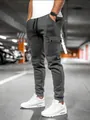 Seitenansicht der schmal geschnittenen, dunkelgrauen Cargo-Jogginghose für Herren - S / Unterteile / Eisengrau