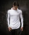 Close-up of men's white long sleeve athletic shirt with motivational sleeve text. - M / Tops / White Type 2