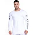 Close-up of men's white compression training shirt with sleeve graphics - M / Tops / White Type 1