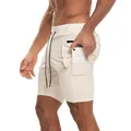 Detalle de los pantalones cortos deportivos de doble capa para hombre con bolsillo interno - M / Bottoms / Beige Liso
