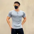 Muscle fit grey ribbed Henley t-shirt for men's fitness and training - M / Tops / Gray