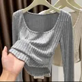 Close-up of grey ribbed knit long-sleeve T-shirt with soft brushed texture and square neck. - S / Tops / Gray