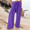 Nahaufnahme der leuchtend lila weiten Baumwollhose mit elastischem Kordelzug am Bund - S / Unterteile / Lila