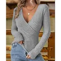 Close-up of elegant grey ribbed V-neck slim fit long sleeve shirt for women - S / Tops / Gray