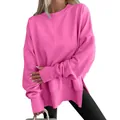 Macro view of a vibrant pink oversized sweatshirt featuring side slits and ribbed cuffs - S / Tops / Rose Red
