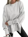 Detail view of grey oversized crew neck sweatshirt with side slits and batwing sleeves - S / Tops / Light Gray