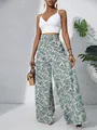 Stylish high-waisted wide-leg pants with a tropical leaf print for a chic summer look - Olive Green