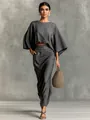 Elegant grey two-piece set featuring a loose round-neck top and a long high-waist skirt. - S / Top And Bottom / Graphite