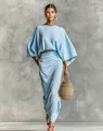 Elegant light blue two-piece set with long sleeve top and high-waisted maxi skirt detail. - Sky Blue