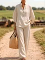 Full view of women's breathable beige linen two-piece set in a rustic outdoor setting - S / Top And Bottom / Apricot
