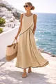 Elegante abito lungo senza maniche in stile resort con bordature nere a contrasto - Champagne