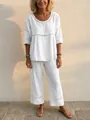 Women's white two-piece linen set with eyelet lace details and loose wide-leg trousers - White
