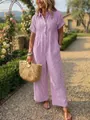 Tuta intera a righe viola con bottoni sul davanti e gamba larga a tutta figura - Taglia S / Top E Pantaloni / Rosa