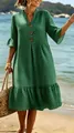Stylish green V-neck bohemian dress with white polka dots and delicate ruffle hem details - S / Top And Bottom / Green Polka Dot
