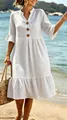White polka dot midi dress with V-neck, button front and ruffle sleeves on beach. - S / Top And Bottom / White Polka Dot