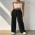 Women's casual high-waisted black wide-leg trousers with loose fit and elastic waistband - S / Bottoms / Black
