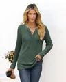 Modern woman wearing dark green ribbed V-neck long sleeve t-shirt in a stylish casual pose - S / Tops / Green