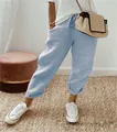 Comfortable light blue linen cropped pants with elastic waist and drawstring detail - S / Bottoms / Sky Blue