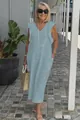 Close-up view of the light blue ruffle sleeve cotton linen maxi dress in a summer setting - S / Bottoms / Light Blue