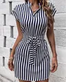 Detailed view of women's blue and white striped v-neck dress with an adjustable waist tie - S / Top And Bottom / Navy Blue