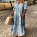 Vista detallada del vestido largo azul con estampado vintage y falda a capas - S / Bottoms / Azul cielo