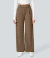 Front view of women's brown high-waisted wide-leg suit trousers with pockets. - Camel